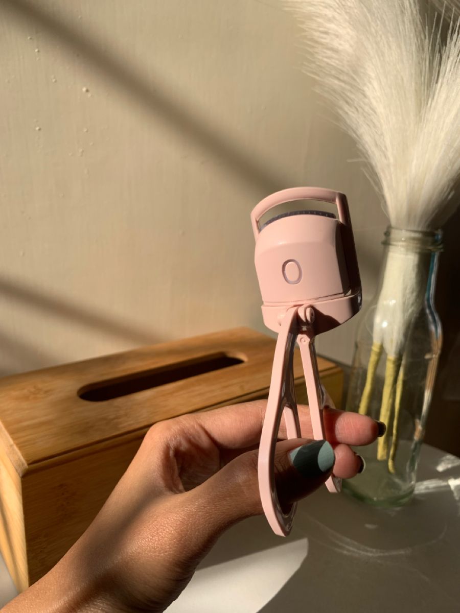 "Recourbe-cils chauffant"