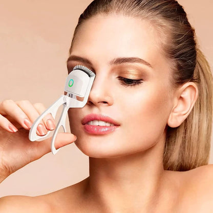 "Recourbe-cils chauffant"